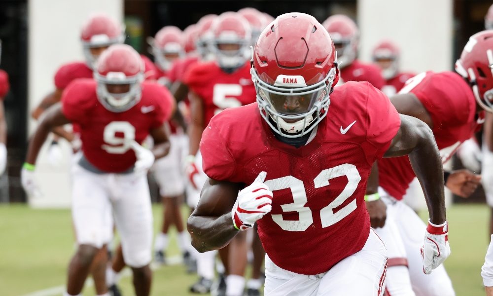 Dylan Moses warms up during Alabama practice