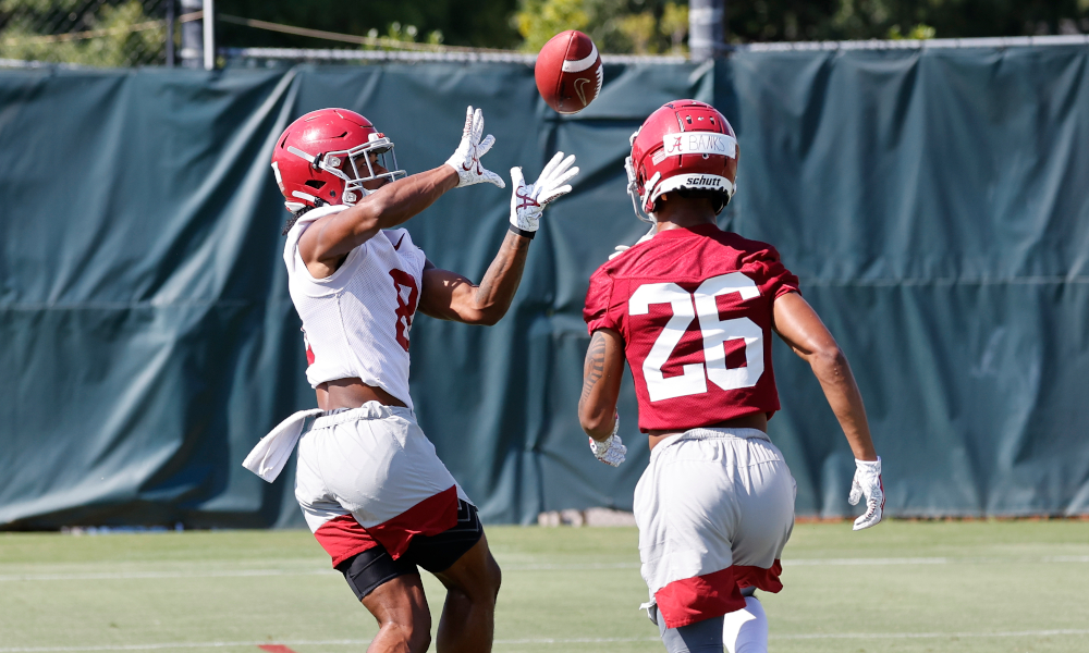John Metchie with a catch against DB Marcus Banks at Alabama fall camp