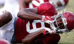 Jordan Battle stretching at Alabama fall practice