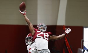 Josh Jobe attempts to knock down a pass at Alabama Monday practice