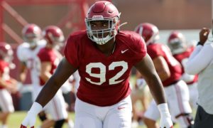 Justin eboigbe going for tackle at Alabama football fall camp