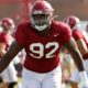 Justin eboigbe going for tackle at Alabama football fall camp