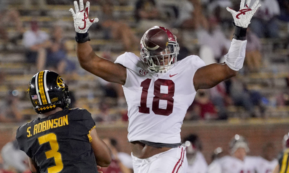 LaBryan Ray (No. 18) of Alabama pressuring Missouri's QB Shawn Robinson