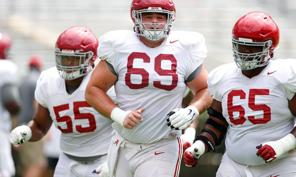 Landon Dickerson runs with Emil Ekiyor and Deonte Brown before final Alabama scrimmage of fall camp
