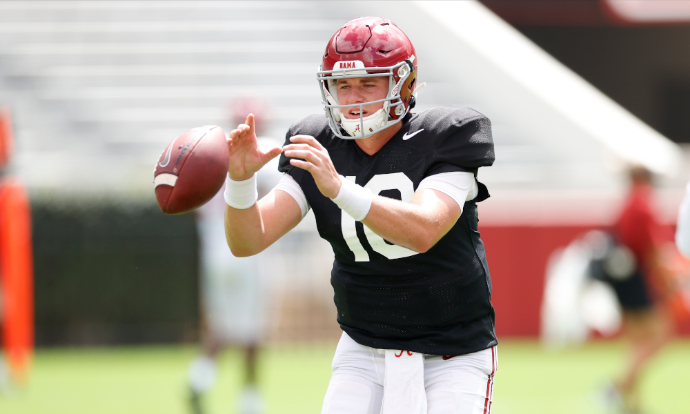 Mac Jones takes a snap during Alabama second scrimmage