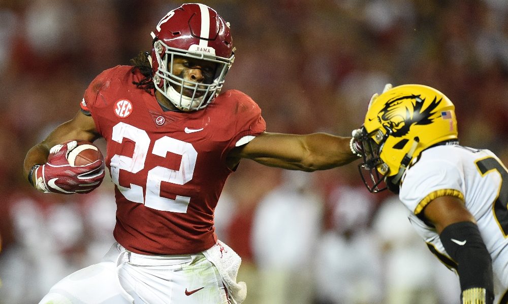 Najee Harris stiff arms Missouri defender