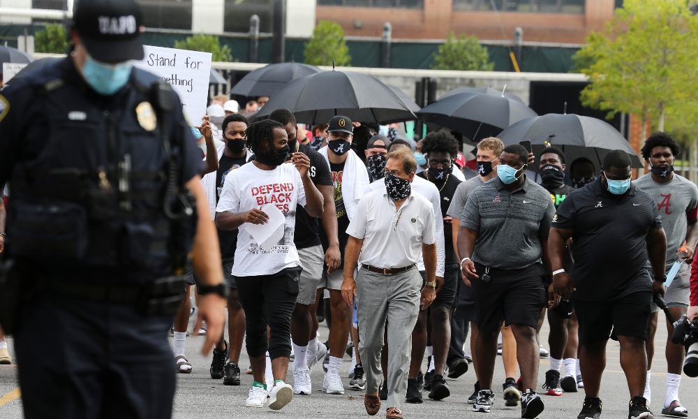 Nick Saban marches with his players to protest racial injustice