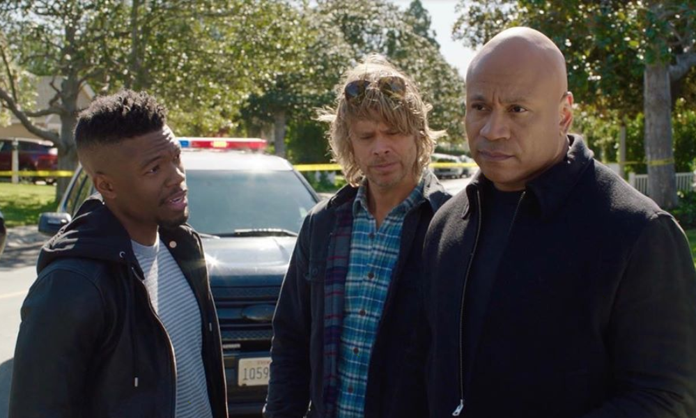 Caleb Castille poses with LL Cool J and Eric Christian Olson on set of NCIS: Los Angeles