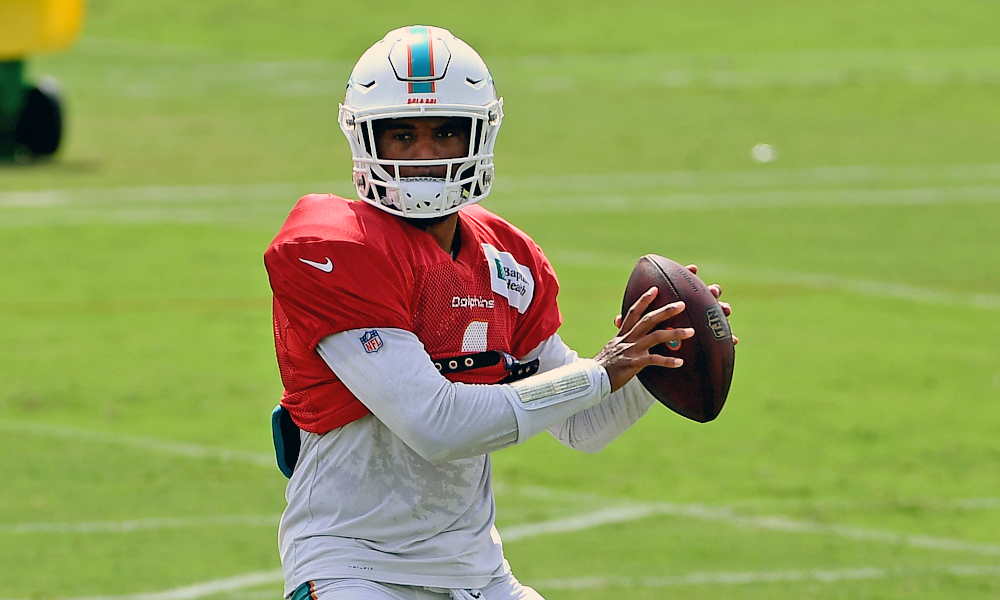 Tua Tagovailoa about to throw a pass at Dolphins training camp