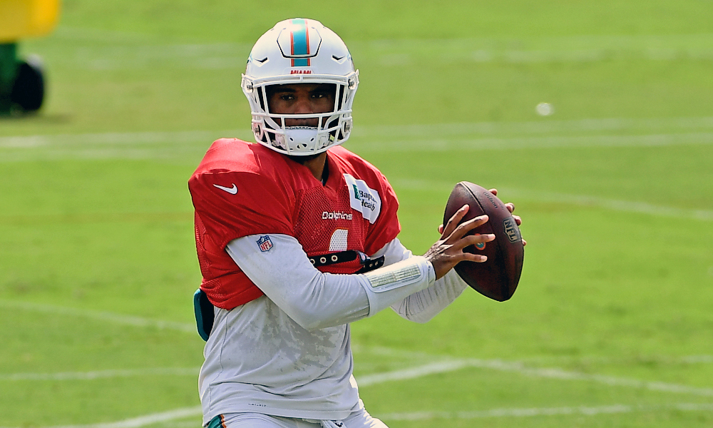 Quarterback Dan Marino of the Miami Dolphins looks on from the