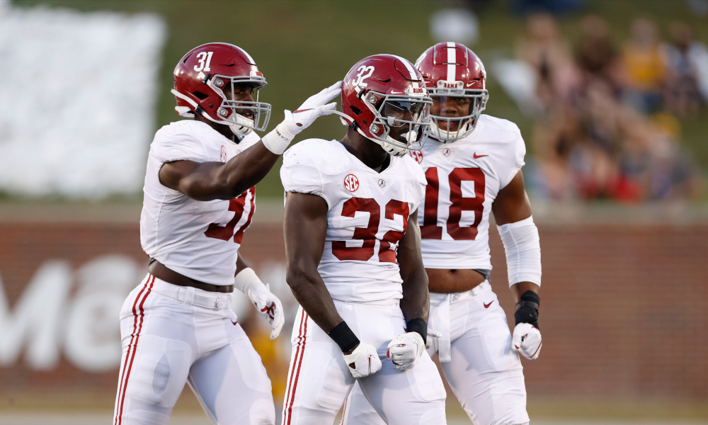 Will Anderson (No. 31) celebrates a sack with Dylan Moses and LaBryan Ray versus Missouri