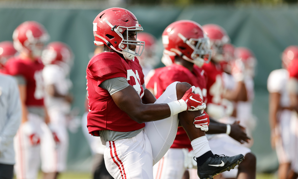 William Anderson (No. 31) stretching at Alabama fall practice