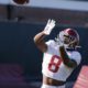 John Metchie prepares to catch a pass at Alabama Football Tuesday practice
