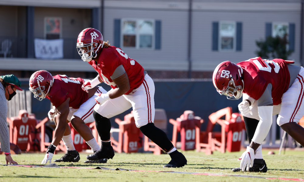 DJ Dale (No. 94) in defensive line drills with LaBryan Ray (No. 18) and Christian Barmore (No. 58) at Alabama