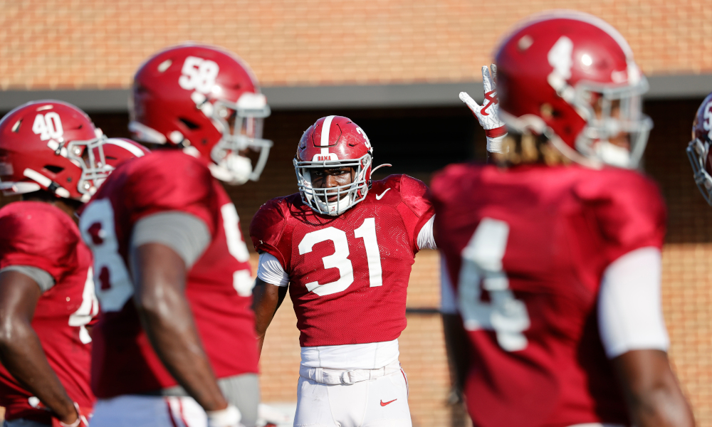 William Anderson with outside linebackers at Wednesday's practice for Alabama