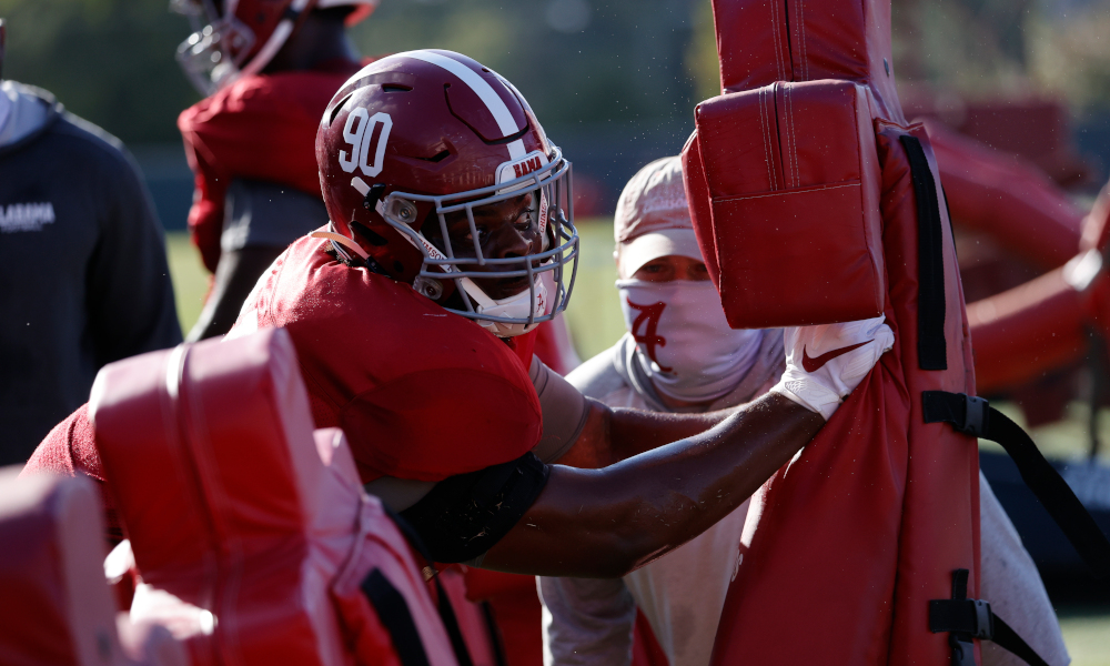 Stephon Wynn (No. 90) working the sled at Alabama during 2020 season