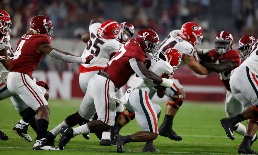 Byron Young (No. 47) records big tackle of Georgia RB Zamir White