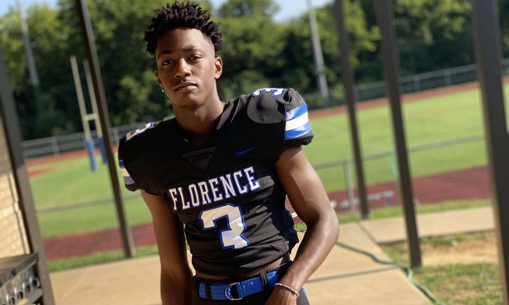 Jahlil Hurley poses for picture in #3 Florence Jersey