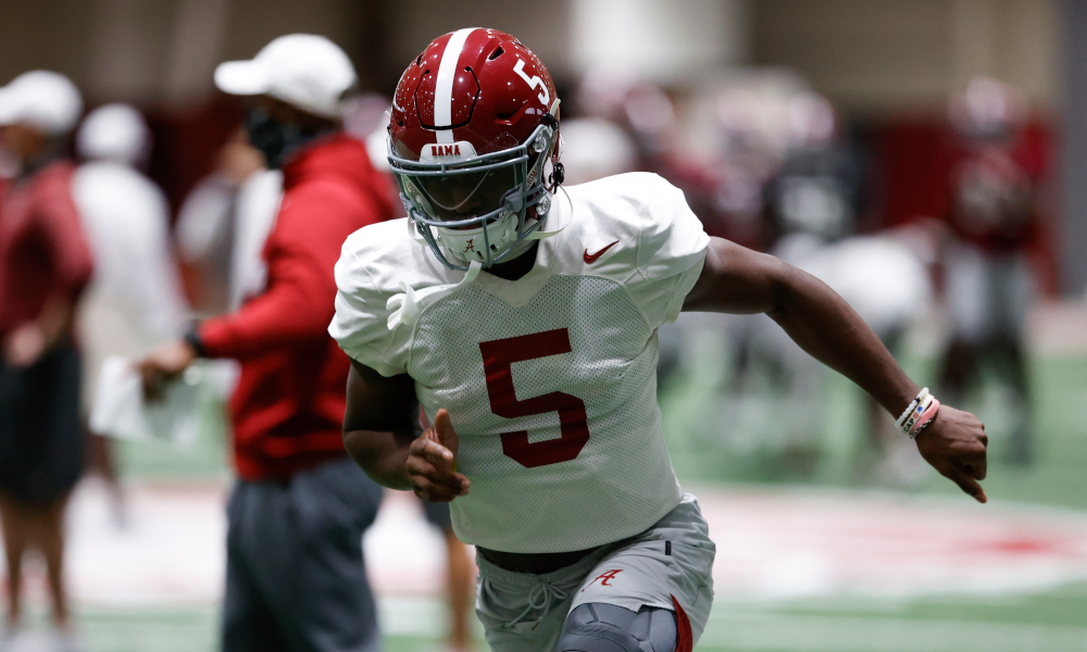 Javon Baker running routes at practice