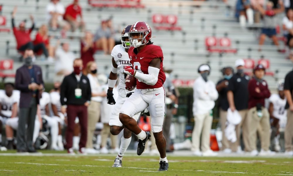 John Metchie runs in a touchdown against Texas A&M