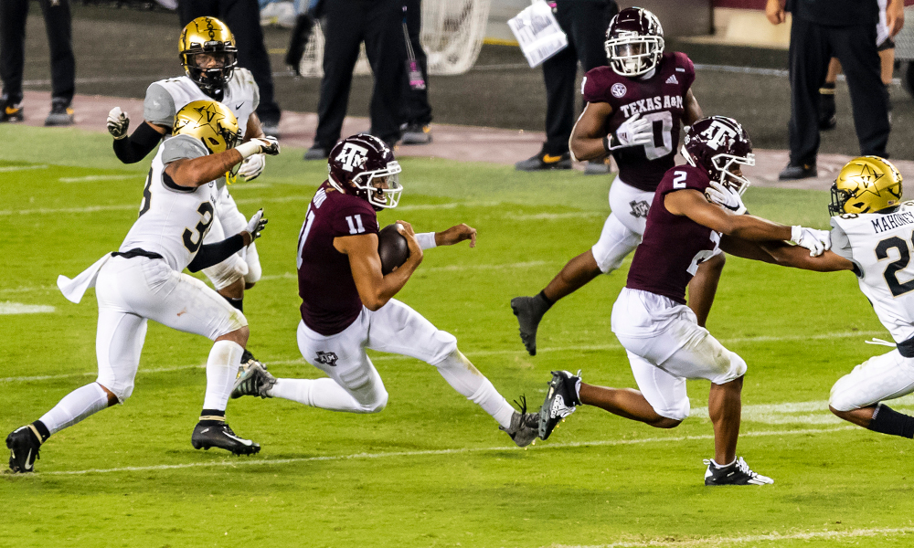 Kellen Mond (No. 11) of Texas A&M runs the ball against Vanderbilt