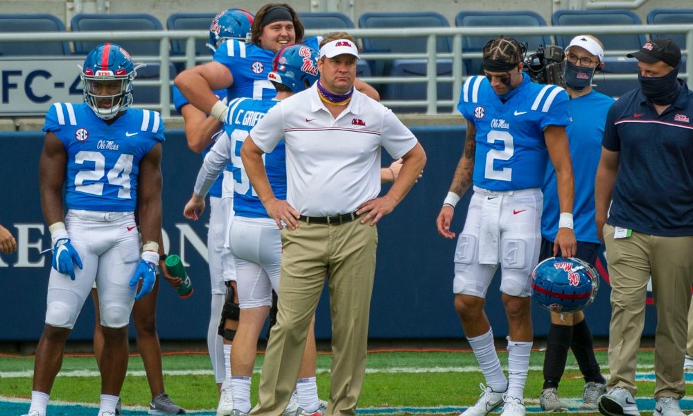 Lane Kiffin watches team from the sideline