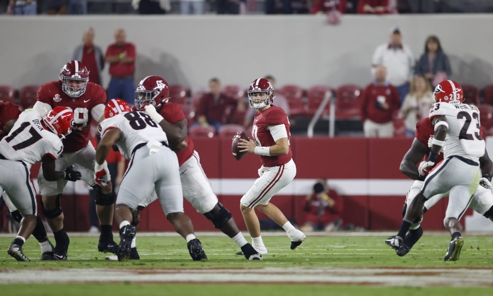 Mac Jones drops back to pass against Georgia