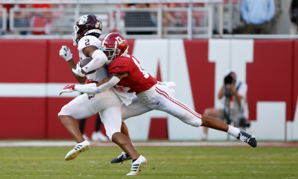 Malachi Moore makes a tackle against Texas A&M