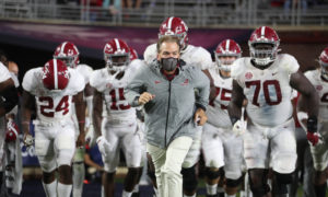 Nick Saban and Alabama players coming on the field versus Ole Miss