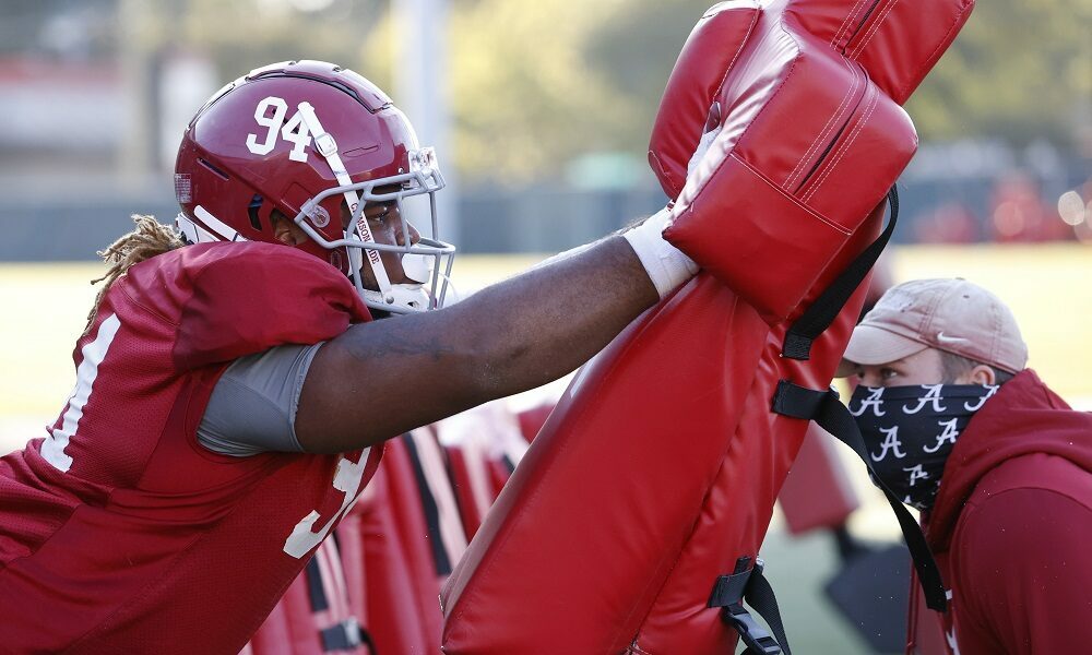 DJ Dale (No. 94) working the sled at Alabama practice in 2020 season