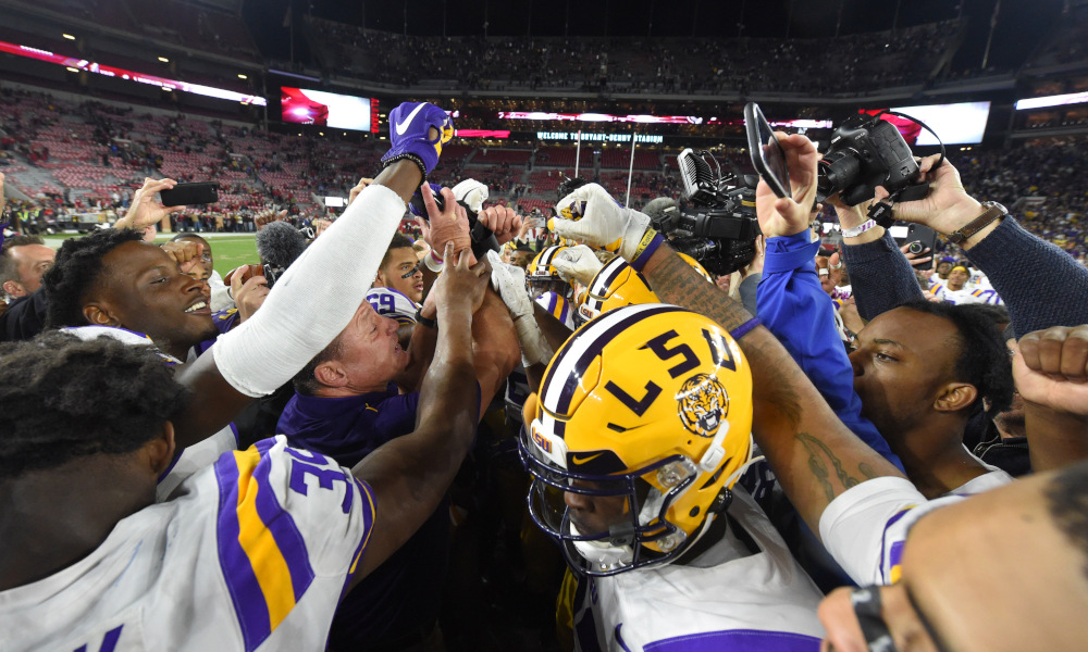 Ed Orgeron and LSU Tigers celebrate 2019 win over Alabama