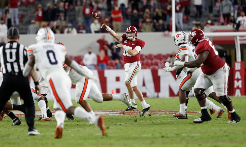 Mac Jones throws a pass versus Auburn in 2020 Iron Bowl