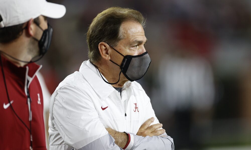 Nick Saban watches from the sidelines against Georgia