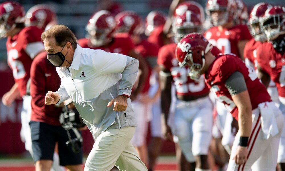 Nick Saban leads Alabama out of the tunnel