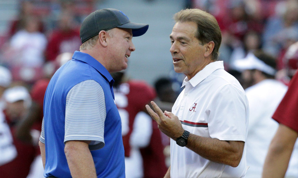 Nick Saban and Mark Stoops talking to each other before Alabama-Kentucky game in 2016