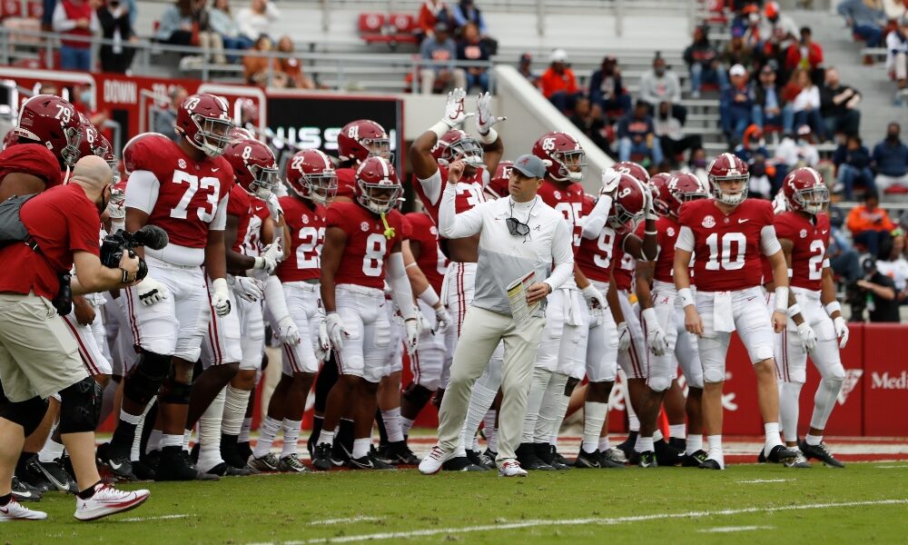 Steve Sarkisian leads Alabama out of the tunnel