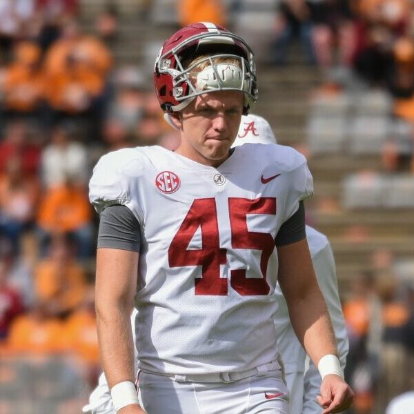 Thomas Fletcher warms up ahead of the Tennessee game