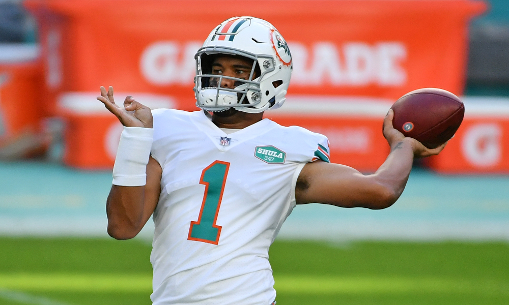 Tua Tagovailoa throws a pass in warmups before facing LA Chargers