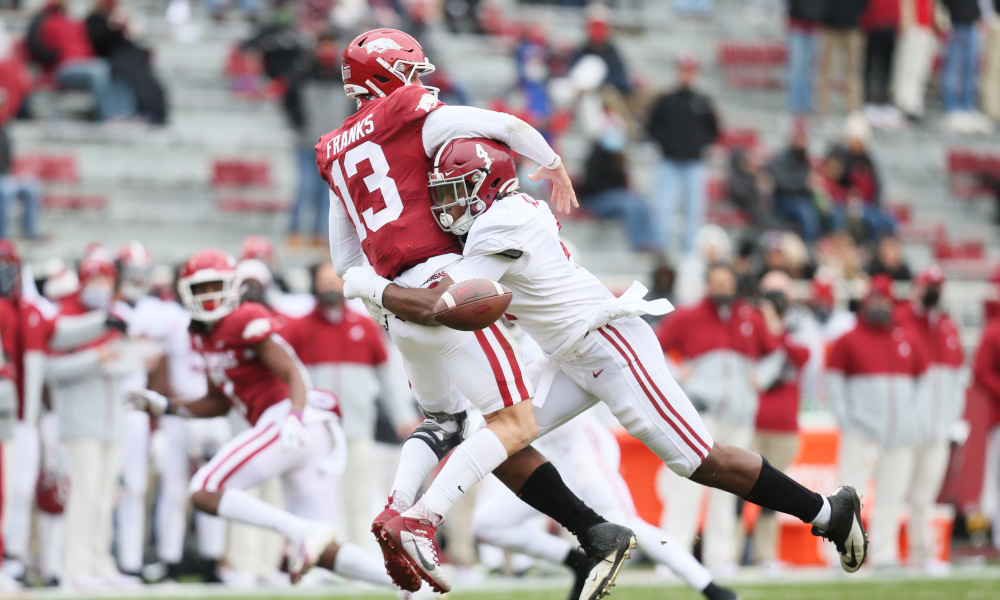 Christopher Allen (No. 4) of Alabama sacks Feleipe Franks of Arkansas