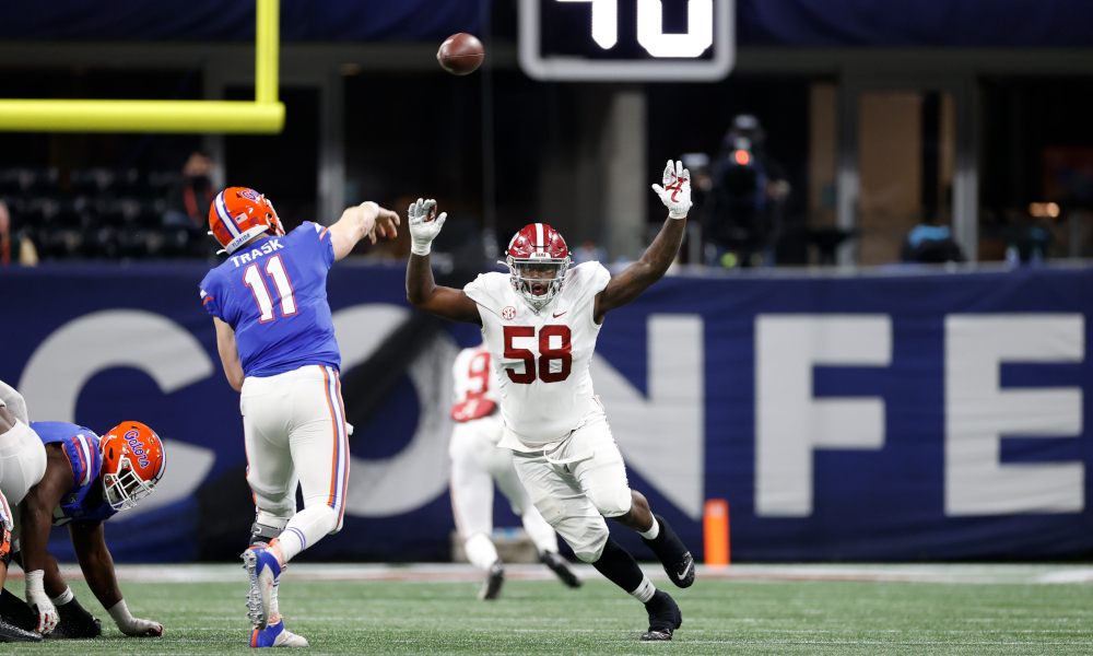 Christian Barmore (No. 58) gets pressure on Florida QB Kyle Trask in SEC title game