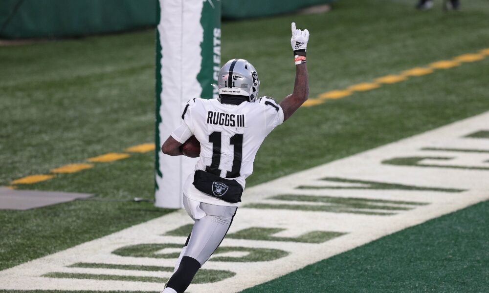 Las Vegas Raiders wide receiver Henry Ruggs III warms up before