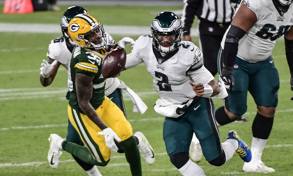 Jalen Hurts running with the ball for Eagles versus Packers
