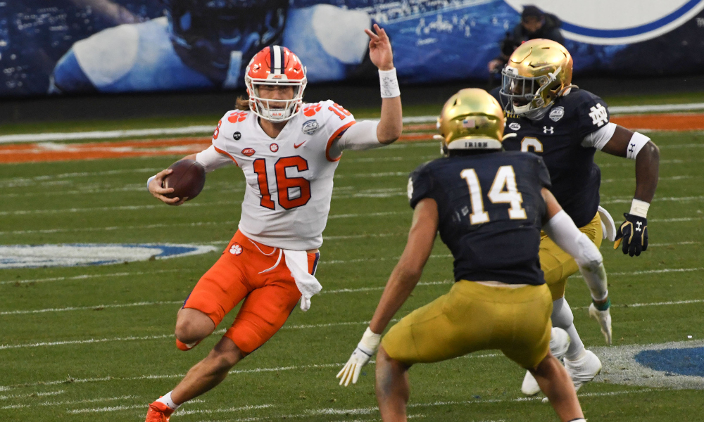 Kyle Hamilton (No. 14) of Notre Dame in his stance versus Trevor Lawrence of Clemson in ACC Championship