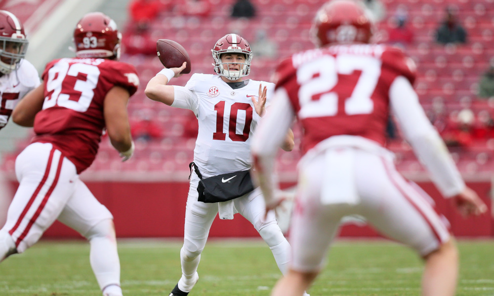 Mac Jones fires a pass downfield against Arkansas