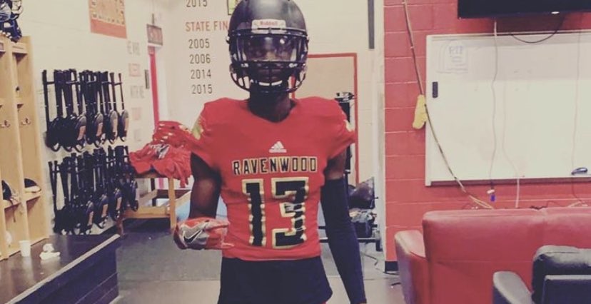 Myles Pollard poses for picture in Ravenwood jersey