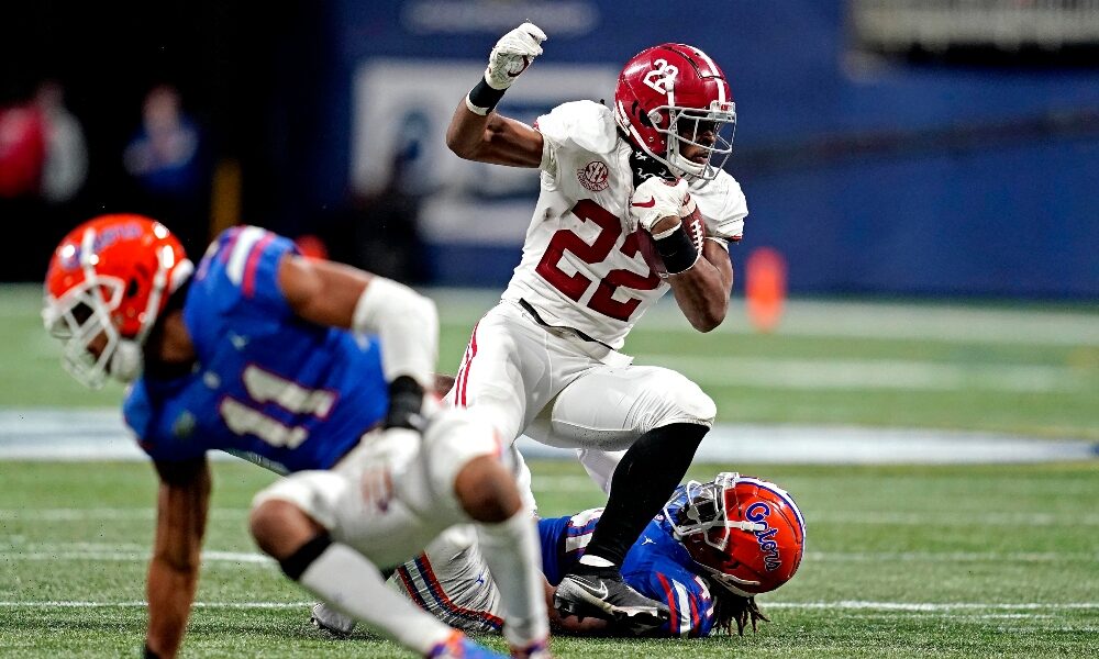 Najee Harris breaks a tackle against Florida