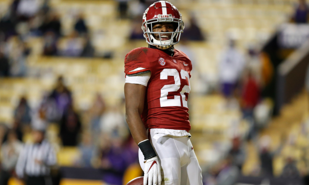 Najee Harris celebrates a rushing TD versus LSU in a 55-17 win for Alabama