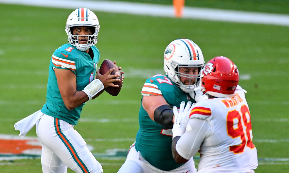 Tua Tagovailoa in the pocket about to throw a pass for Dolphins versus Chiefs