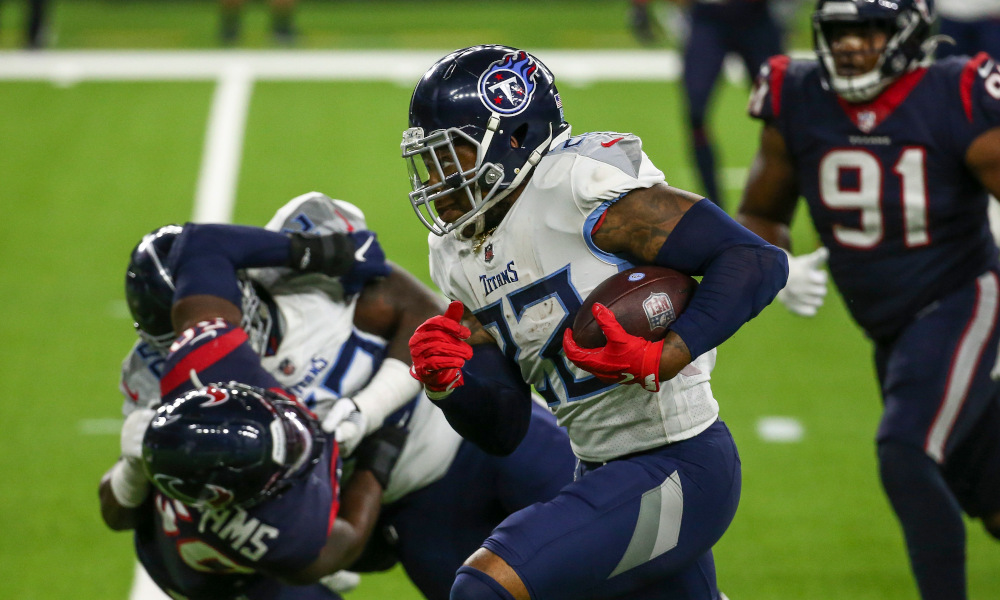 Derrick Henry, RB of Tennessee Titans, runs the ball against Houston Texas