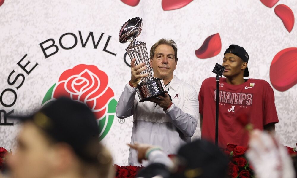 Nick Saban lifts the Rose Bowl trophy